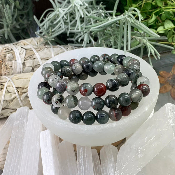 Pulsera de piedra de sangre africana Mala con bolsa de terciopelo