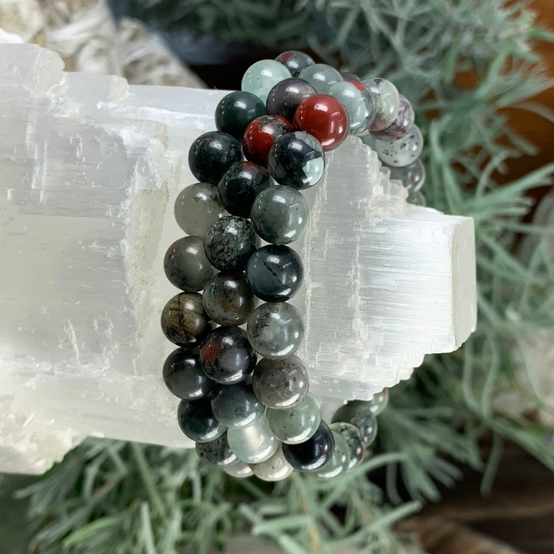 Pulsera de piedra de sangre africana Mala con bolsa de terciopelo