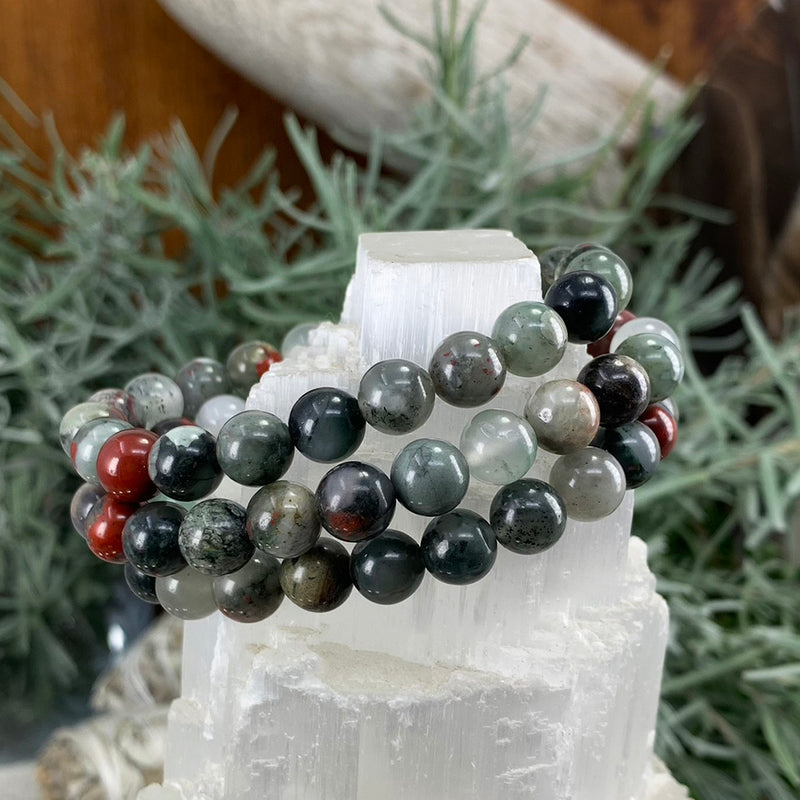 Pulsera de piedra de sangre africana Mala con bolsa de terciopelo