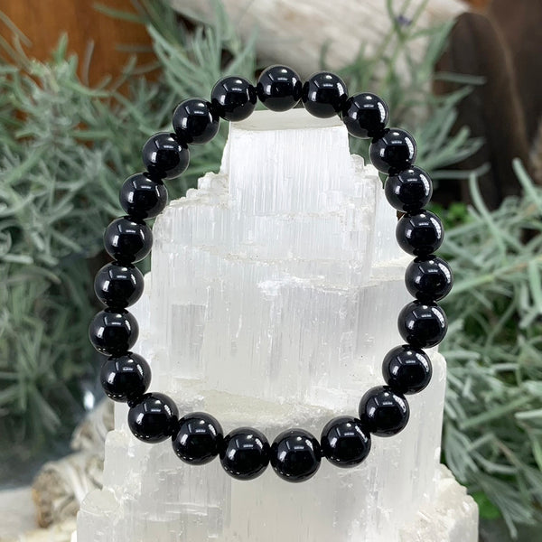 Mala zwarte obsidiaan armband met fluwelen zakje