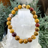 Bracciale Mala in diaspro mookaite dorato con custodia in velluto