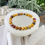 Bracciale Mala in diaspro mookaite dorato con custodia in velluto