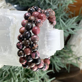 Bracciale Mala in rodonite con custodia in velluto