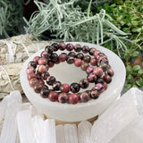 Bracciale Mala in rodonite con custodia in velluto