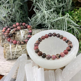 Bracciale Mala in rodonite con custodia in velluto